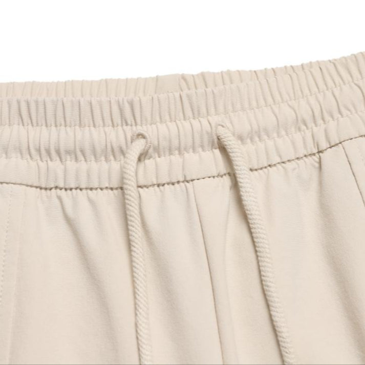 WOMEN'S ARCHELON WOVEN TRAINING WIDE PANTS L/BEIGE