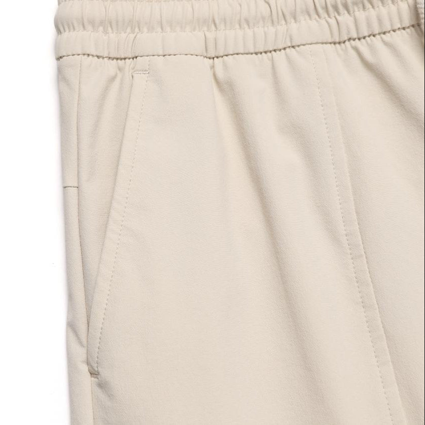 WOMEN'S ARCHELON WOVEN TRAINING WIDE PANTS L/BEIGE