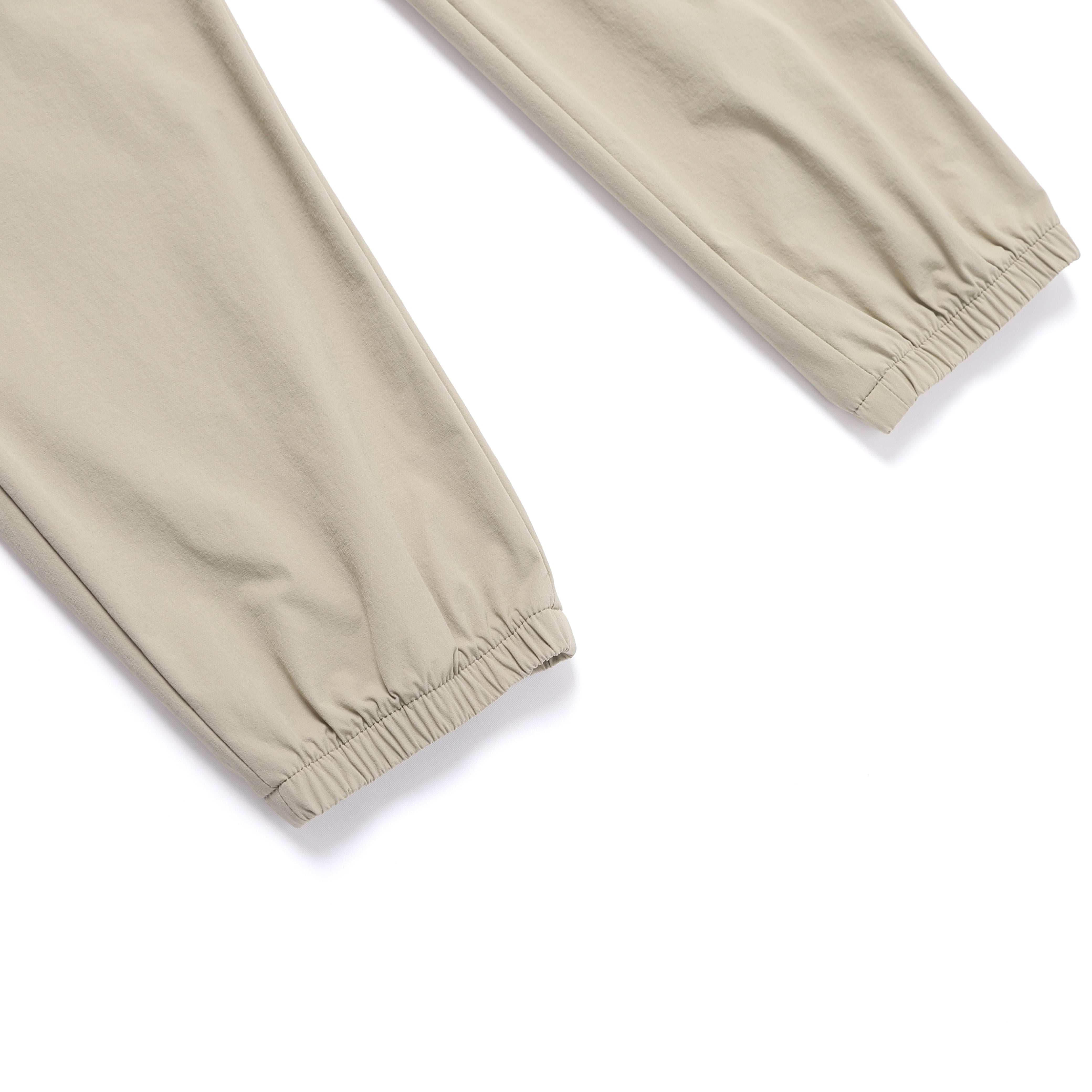 WOMEN ARCHELON WOVEN STRETCH TRAINING JOGGER PANTS MOURNING BEIGE