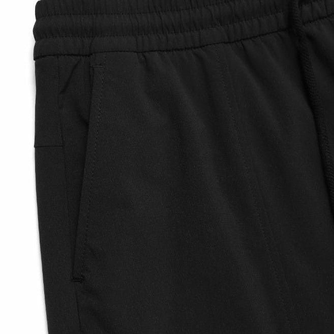 WOMEN’S ARCHELON WOVEN TRAINING WIDE PANTS CARBON BLACK